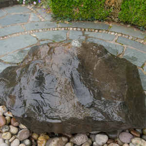 boulder drilling water feature
